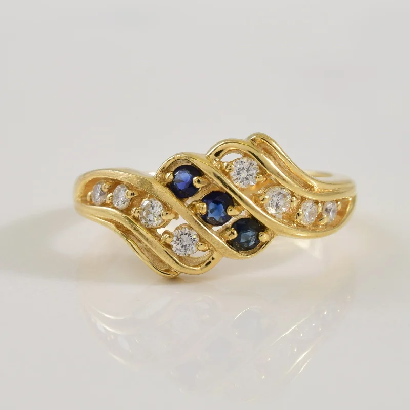 Waterproof Stainless Steel Jewelry For Lasting Beauty Sapphire & Diamond Bypass Ring | 0.20ctw, 0.12ctw | SZ 6 |